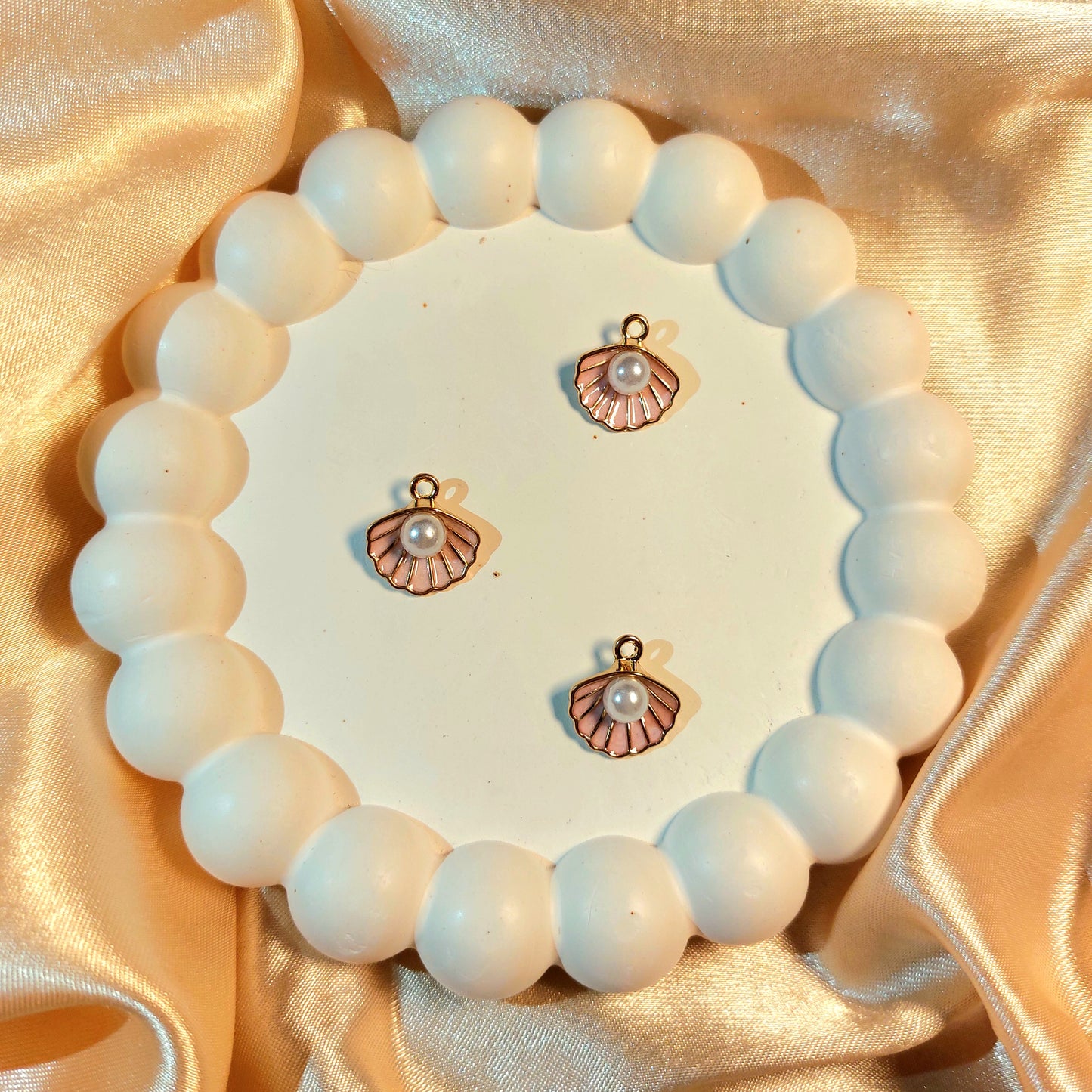 Shell charms